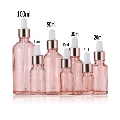 China Cosmetic in stock 5ml 10ml 15ml 20ml 30ml Rose Gold Empty Glass Oil Bottle Hair And Eye Care Essential Oil Dropper Bottle for sale