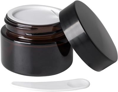 China Factory Wholesale 5g 10g 20g 30g 50g 100g Amber Glass Jar Empty Cosmetic Lotion Container With Inner Layer Black Lid for sale