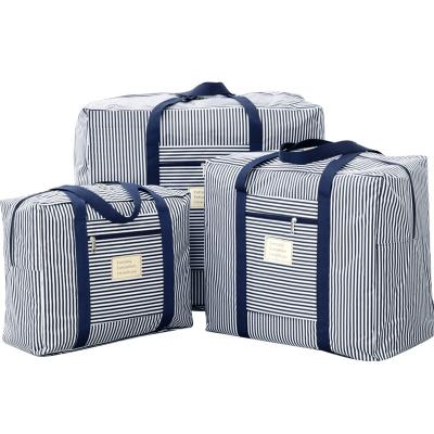 China Sustainable Five Point Grid Travel Bag Clothing Storage Bag Oxford Cloth Luggage for sale