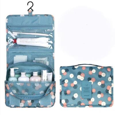 China Folding Finished Cosmetic Bag Vintage Hang Hook Toiletries Box Portable Travel Colorful Storage Bags for sale