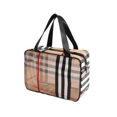 China Fashion Portable And Organize Multifunctional Grid Storage Bag Waterproof Travel Striped Cosmetic Bag for sale