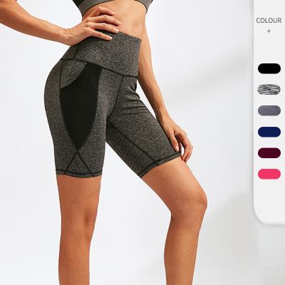 China Breathable Seamless Women Gym Yoga Shorts Mid Waisted Women Yoga Shorts Sets Solid Fitness Material for sale