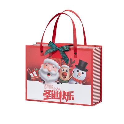 China Recyclable Christmas gift box Red Color Paper Custom Logo Design Magnetic Closure Cardboard Packaging Box For Christmas Gift for sale