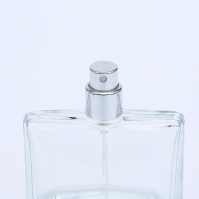 China Luxury Empty Transparent Rectangle Spray Perfume Glass Bottle Pump Sleeve Pilfer Proof for sale