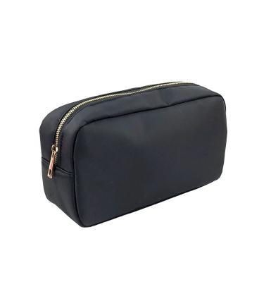 China Cute Portable Cosmetic Bag Large Capacity Custom Simple Black Small Travel Cosmetic Bag for sale