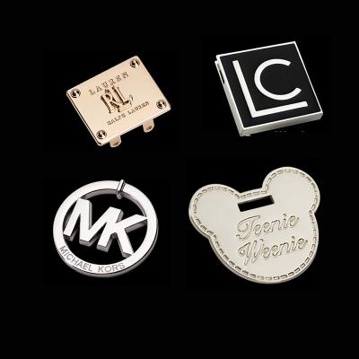 China Sustainable Premium Custom Clothing Accessories Seawater Resist Metal Brand Engraved Logo Sewing Labels Tags For Swimwear for sale