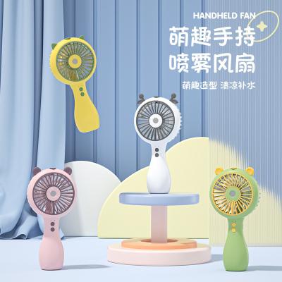 China New Design Factory Popular Portable Water Spray Mist Fan Electric USB Rechargeable Hand Mini Fan for sale