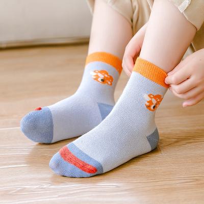 China 21 QUICK DRY children's socks autumn and winter new cartoon dinosaur tube boy socks cotton baby warm sports socks for sale