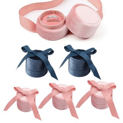 China Protect Wholesale OEM Fashion Velvet Jewelry Storage Box For Ring Necklace Ribbon Round Shaped Jewelry Box for sale