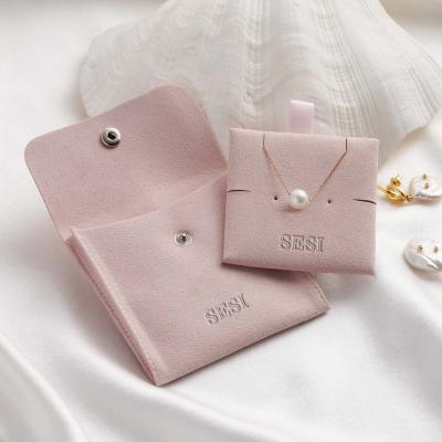 China High Quality Morden Jewelry Pouch Pink Button Up Microfiber Flash Jewelry Pouch With Insert Pad for sale