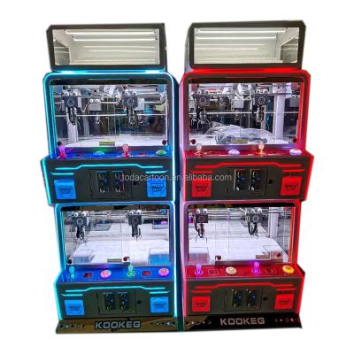 China 2021 New Model Four Players Inside Metal Cabinet Gifts With Glass Toy Crane Machine for sale