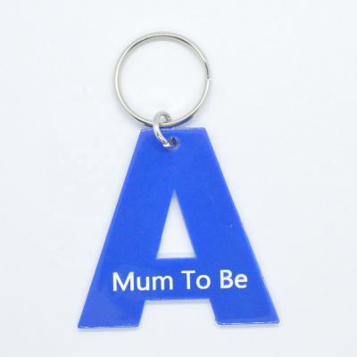 China Plastic OEM Personalized Custom Acrylic A Shape Letter Monogram Blue Engraved Acrylic Key Chain With Tassel for sale