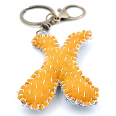 China Custom logo custom initial key holder plush fabric X keychains key chain key chain for sale