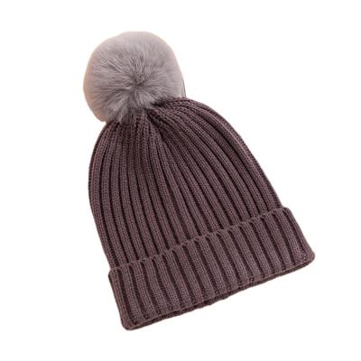 China Fashion Solid Color Winter Hat COMMON Best Selling Custom Knitted Beanie Hat With Pom Pom for sale