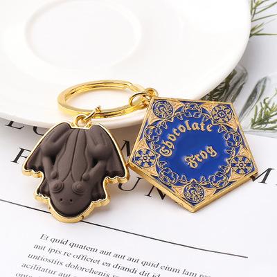 China Metal Chocolate Frog Gold Color Metal Hogwarts School Master Chain Pendant Key Ring for sale