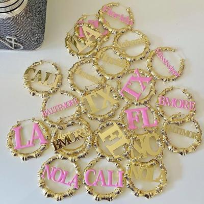 China CLASSIC luxury custom oil rose gold gold fashion trend drop women 2021 custom kids name stud earrings for sale