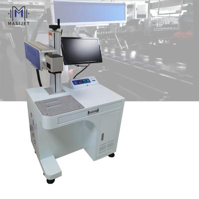 China Laser Marking Plastic Bottle Silicone Wristband Engraving CO2 Laser Marking Machine Paper Cut Laser Printer for sale