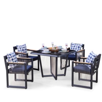 China Modern Exclusive Modern Aluminum Rope Dining Table Patio Furniture Leisure Rattan Furniture Set for sale