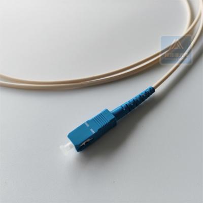 China Armored Fibre Optic Pigtails SC UPC 3.0mm Ivory Lszh Fibre Optic Cable Flame Resistant for sale