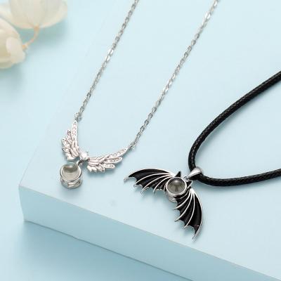 China Antique Silver Jewelry Angel Demon Pendant Necklace Vintage FASHIONABLE 925 Silver Projection Lovers Necklace 100 Languages ​​I Love You for sale