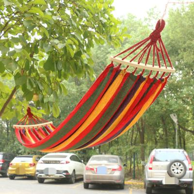 China Factory Wholesale Durable Anti Rollover Blue Red Canvas Rainbow Double Single Swing Outdoor Hammock With Stick for sale