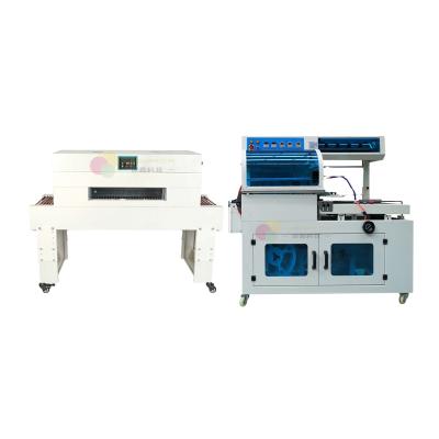 China Semi Automatic Food PVC/PP/POF/PE Film Shrink Paper Wrapping Packing Machine Shrink Packing Machine Parts for sale