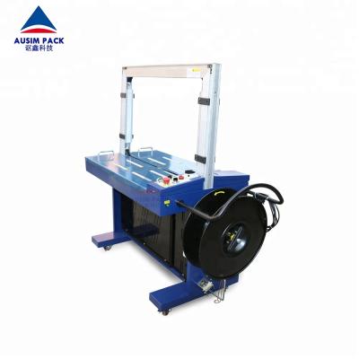 China High Quality Food Grade Automatic Box Case PP PET Standard Strapping Machine Without Motorized Table for sale