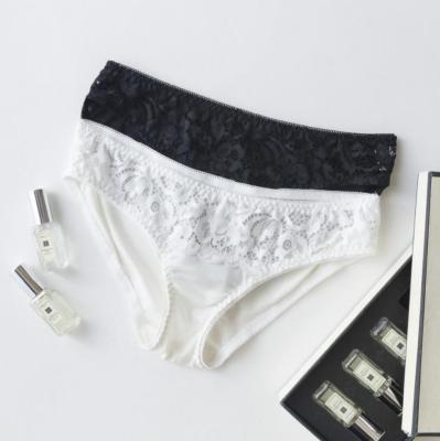 China New Arrival Breathable 100% Pure Color Ladies Silk Low Waist Panties Lace Up Hollow Out Underwear For Women for sale