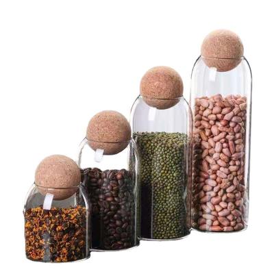 China Sustainable Household Jar Storage Glass Spherical Wooden Stopper Sealed Jar for sale