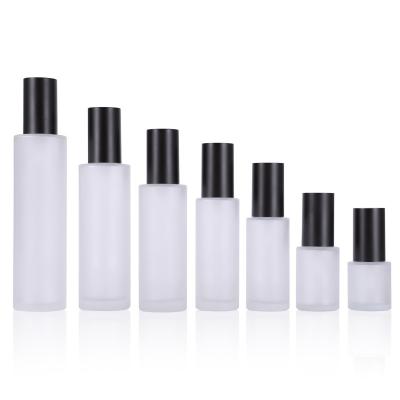 China Luxury Cosmetic Frosted Glass Spray Bottle Cosmetic Glass Bottle With Pump for sale