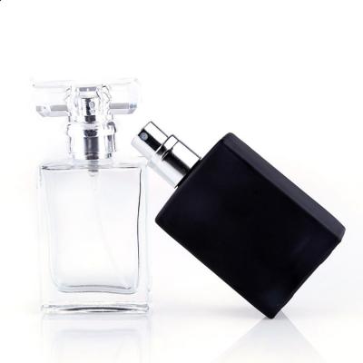 China Cosmetic Perfume Bottle Packaging Transparent Glass Bottle Spray Glass Bottle for sale