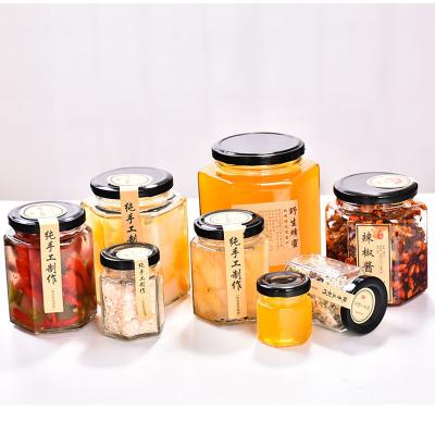 China Wholesale Honey Glass Jar Jam Bottle Hexagonal Food Sealed Glass Jar With Cover for sale