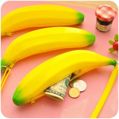 China New 2022 Waterproof Kids Pinch Mini Coin Purse Student Silicone Banana Pouch Small Silicone Purses For Women for sale