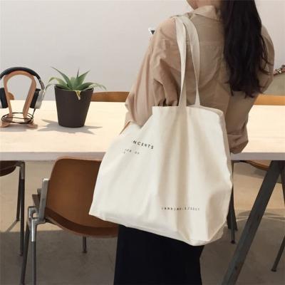 China 2022 New Arrival Solid Color Fashion Canvas Shopping Bag Folding Luxury Casual Shopping Bag Custom Shopping Bags for sale