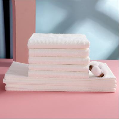 China Maternal hotel compressed towel and childcare products non-woven cotton thickened disposable bath towel for sale