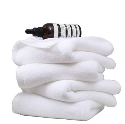 China Wholesale White Salon Towel Compressed Soft 35*75cm Thickened Absorbent Hotel Towel for sale