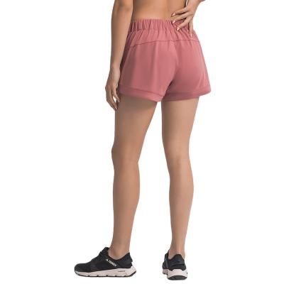 China New Yoga Sports Running Stretch Fitness Sports Casual Shorts QUICK DRY Women Elastic Lace Up Shorts for sale