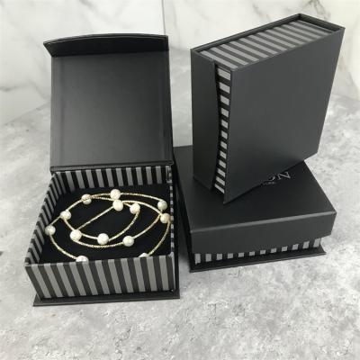 China Black Luxury Handmade Clothing Gift Packaging Shoe Accessories Customized Jewelry Gift Stripes Book Shape Folding Paper Boxes for sale