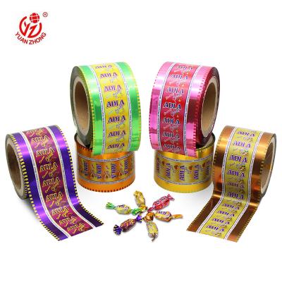 China Custom Printed Moisture Proof Transparent Or Metallic PET Twisted Food Grade Chocolate / Candy Packaging Film for sale