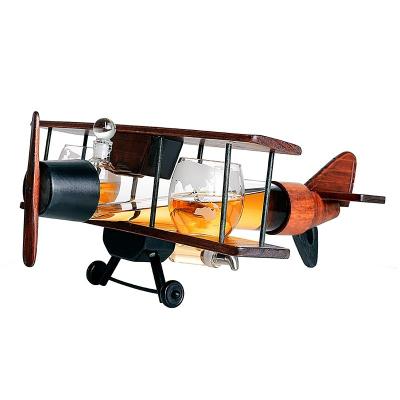 China Hot Selling Unique Shaped Airplane Shaped Whiskey Decanter Liquor Glass Decanter With Wooden Stand For Bourbon Great Gifts For Men for sale