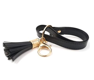 China Hot Selling Fashion Personality Car Ornament Tessel Tassel Leather Key Chain Lanyard Custom Made Multicolor Vegan Leather Wristband for sale