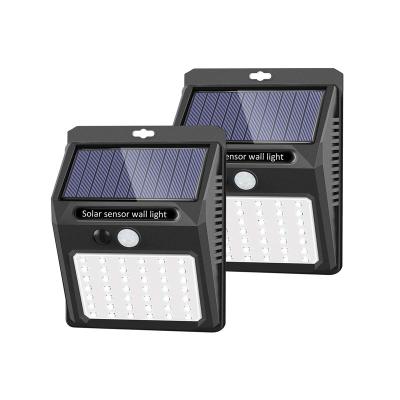 China Outdoor 20 LED Garden Fence Wall Patio Solar Powered LED PIR Motion Sensor Light for sale