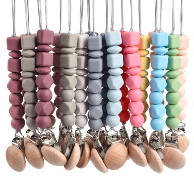 China BPA Free Round Beads Wooden Baby Pacifier Clip Silicone Dummy Holder Chain Clip for sale