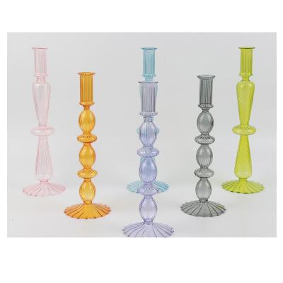 China 2022 China Innovative Home Candle Holder Products Decoration Glass Moon Shape Glass Crystal Candle Stick Holders for sale