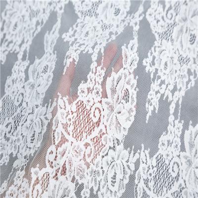 China New Design Viable Hot Selling 100% Cotton Brocade Embroidered Lace Up Fabric Wedding Mesh Dress for sale