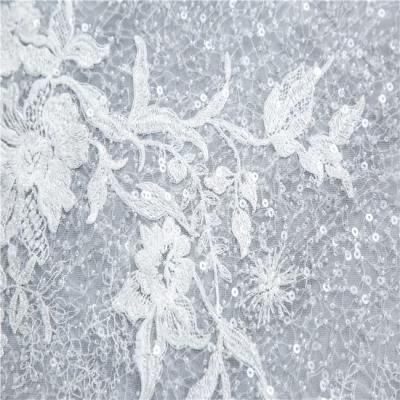 China Sustainable Factory Supplying New Design White Embroidered Lace Fabric For Wedding for sale