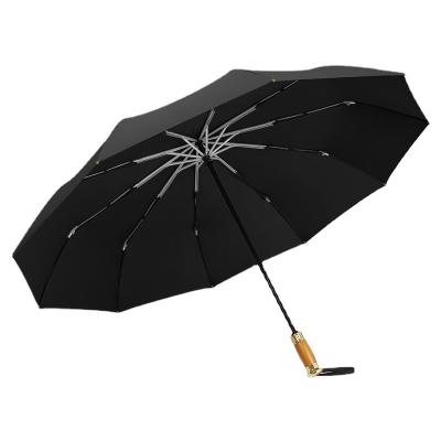 China 2022 modern outdoor custom logo folding sun travel wooden automatic windproof golf umbrella custom prices for sale