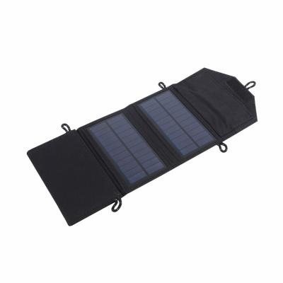 China Bolsa de paneles solares de PVC 600D Cargador solar portátil de 7 vatios para dispositivos de carga al aire libre en venta