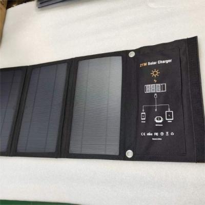 China Bolso portátil de paneles solares plegables de 21W para viajes de campamento en venta