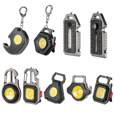 China Super Mini Factory Hot Refillable Portable Pocket Mini Keychain Torch Flashlights With Bracket Bottle Opener And Magnet for sale